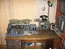 Рабочий стол на котором слева виден Васин  МЭЗ, а с права, в шкафу, другие его ламповые катушечники.